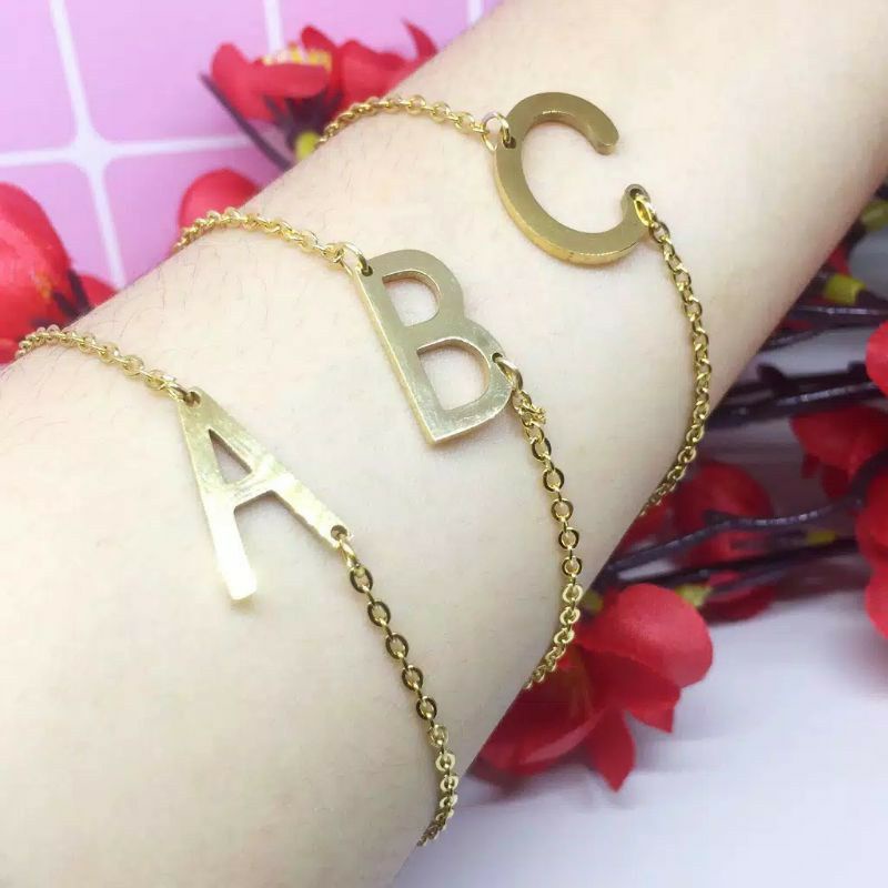 Gelang Huruf Titanium
