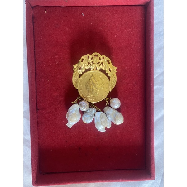 Bros mutiara barok koin