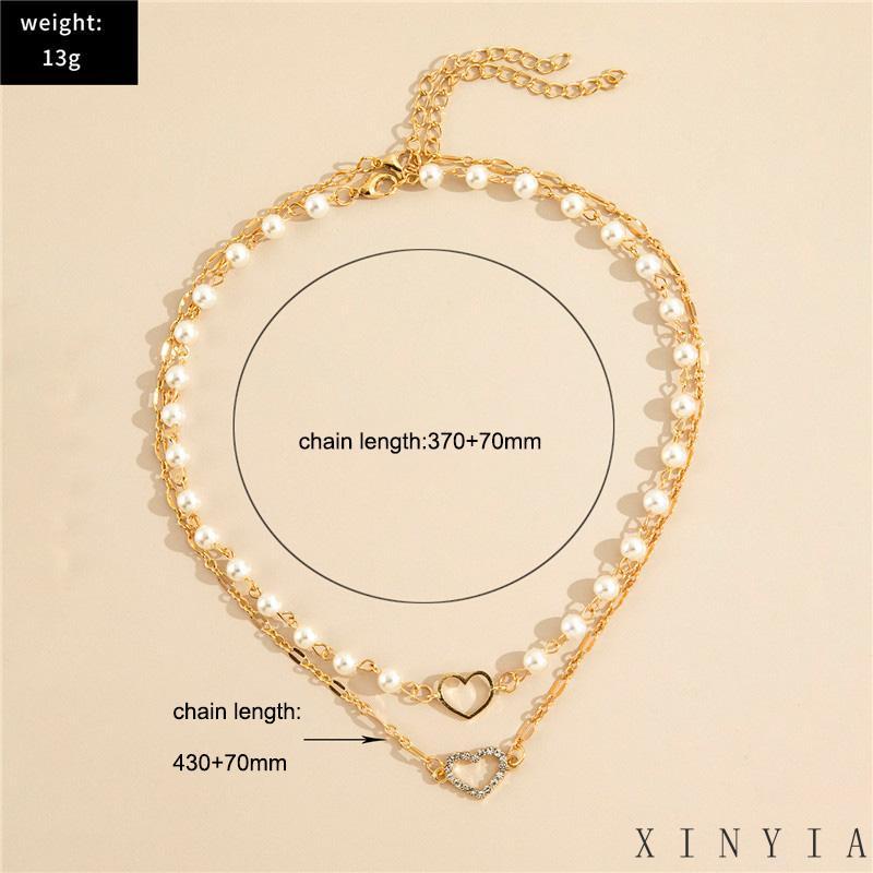 Kalung Rantai Liontin Hati Hollow Hias Mutiara + Berlian Imitasi Gaya Retro Untuk Wanita XIA.ID