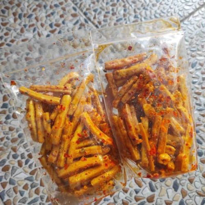 

KERUPUK NONI NONI PEDAS / CEMILAN PEDAS