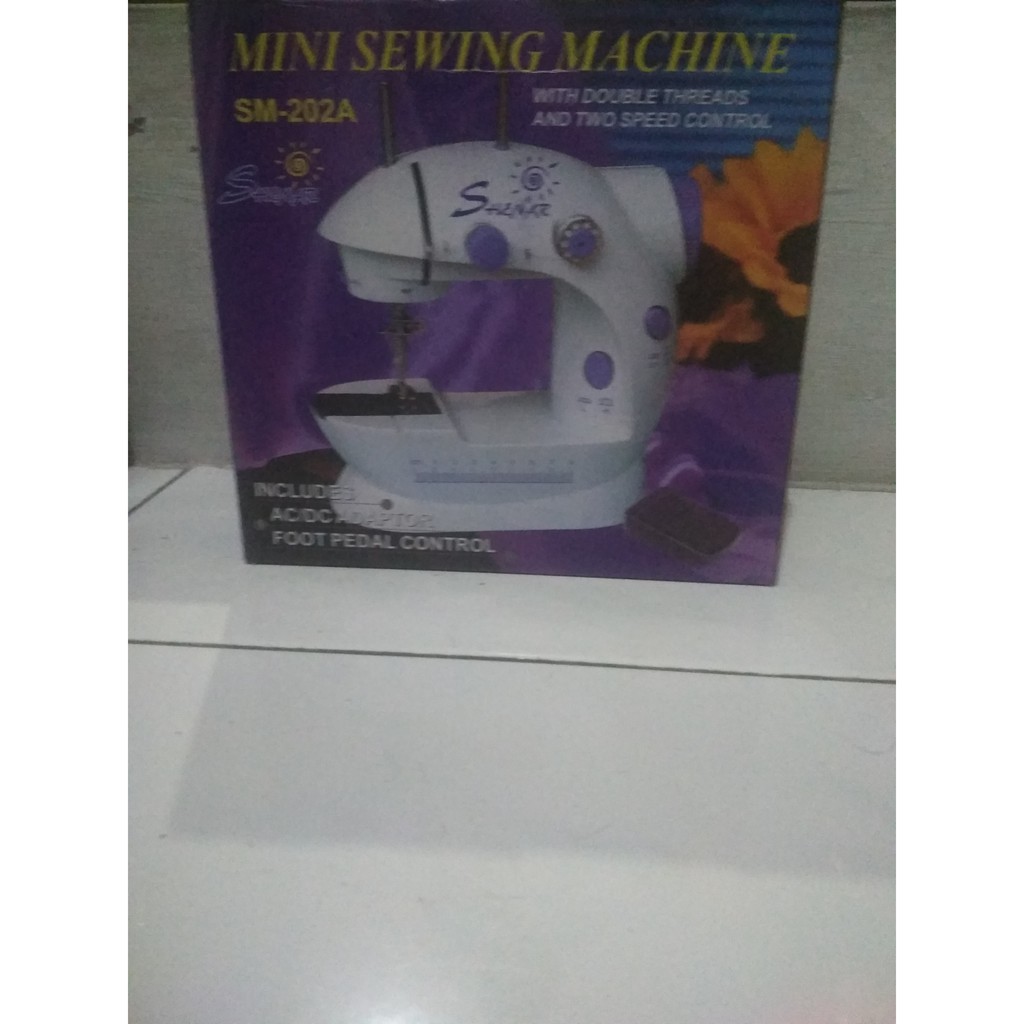 MESIN JAHIT PORTABLE MINI SM202A
