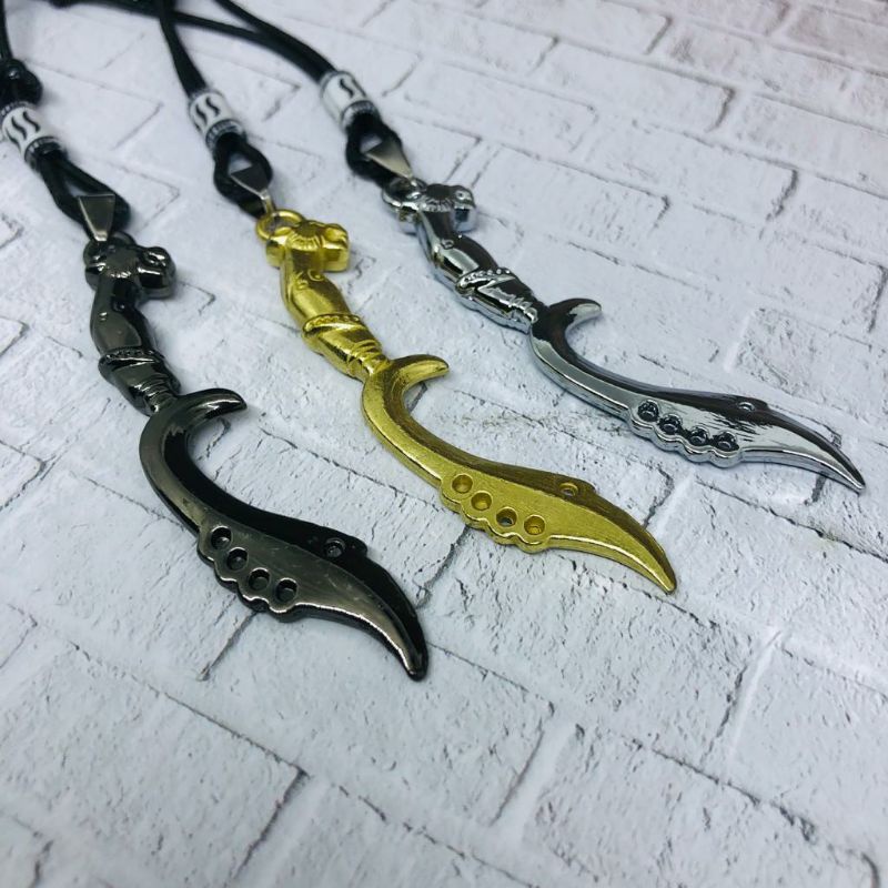 Kalung Pria Keren Tali Korea Hitam Bandul Kujang Titanium Gold/Hitam/Silver