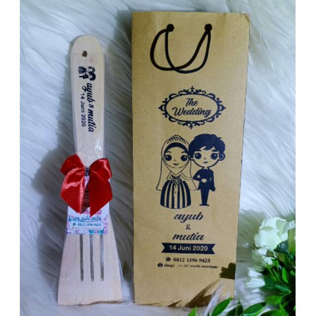 

souvenir sotil lobang free paper bag