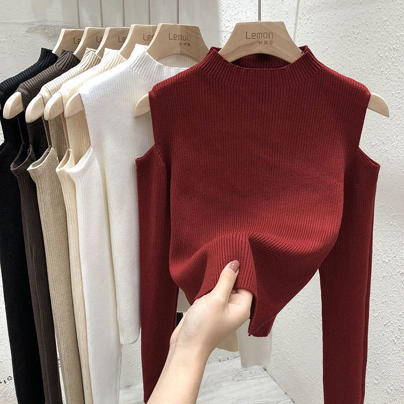 Red Sweater wanita 2022 musim semi dan musim gugur niche baru hitam slim fit dan atasan lengan panjang off-the-shoulder ramping dengan kemeja rajutan bottoming