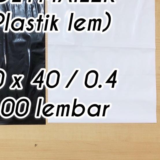 

☇ plastik packing POLYMAILER 30x40 0.4 100 lembar hitam putih plastik lem ◊