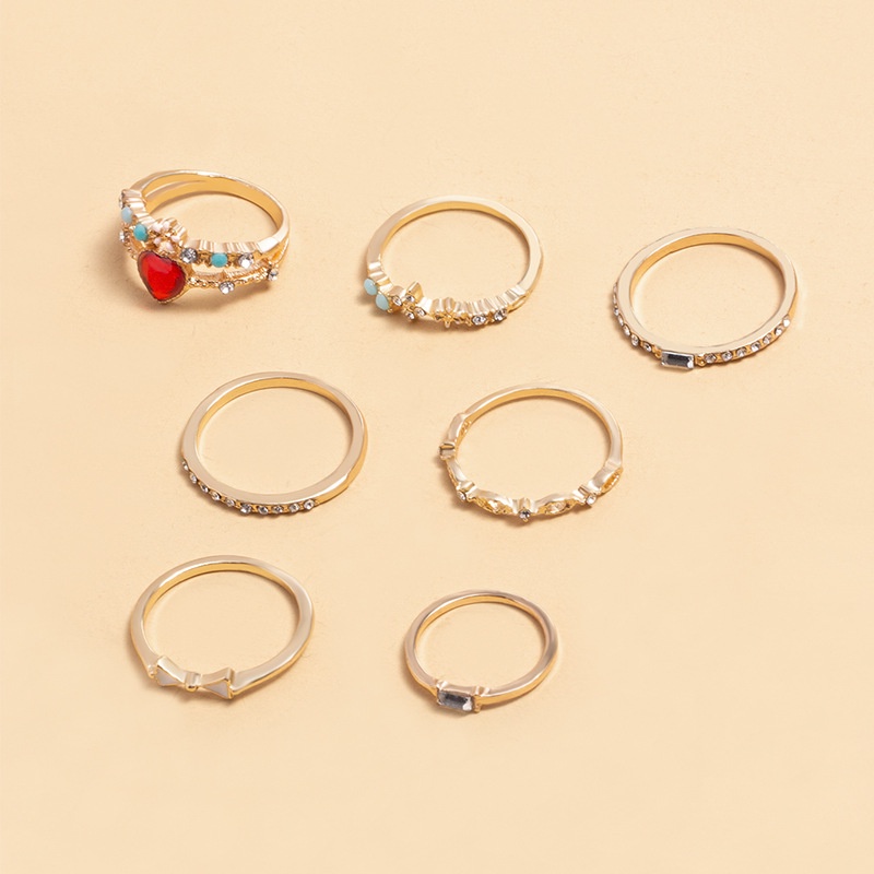 7 Pcs / Set Cincin Jari Desain Hati Bunga Bintang Aksen Kristal Mutiara Berlian Imitasi Bahan Alloy Untuk Wanita