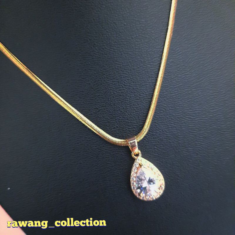 kalung titanium gold belut plus liontin permata putih