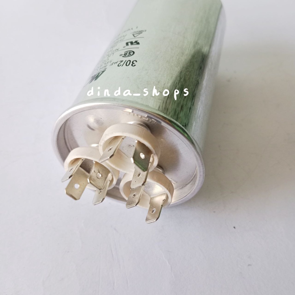 Kapasitor AC 30 + 2 UF / Capacitor AC 30 + 2 Mikro Merk Starmec