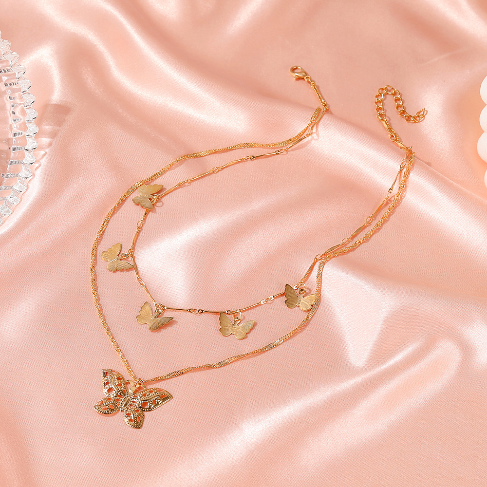 Retro Sederhana Enam Kalung Butterfly Lima Fashion Korea Mengosongkan Rantai Clavicle Wanita Empat Musim Perhiasan Kupu-kupu Yang Indah