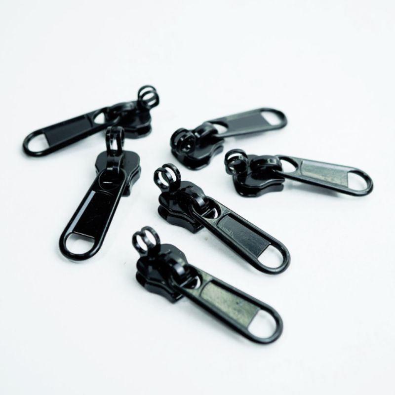 Kepala resleting  Koper Sedang No.8/ Kepala resleting tanduk / kepala resleting koper kunci