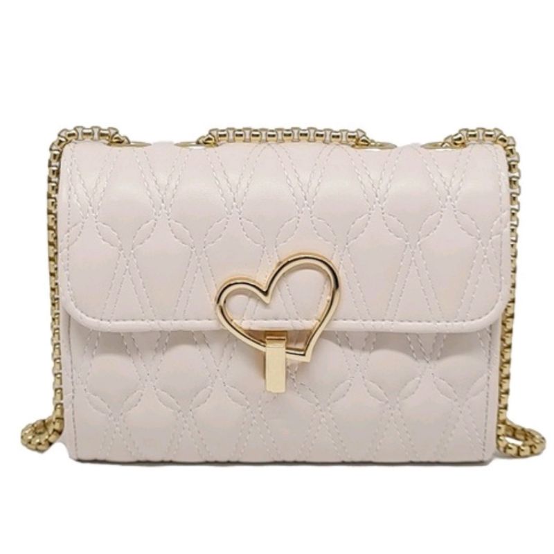 London Berry by Huer Lovve Quilted flap slingbag Beige