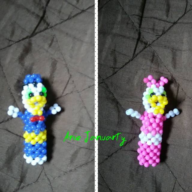 

Sarung pensil manik Donald dan Dessy duck