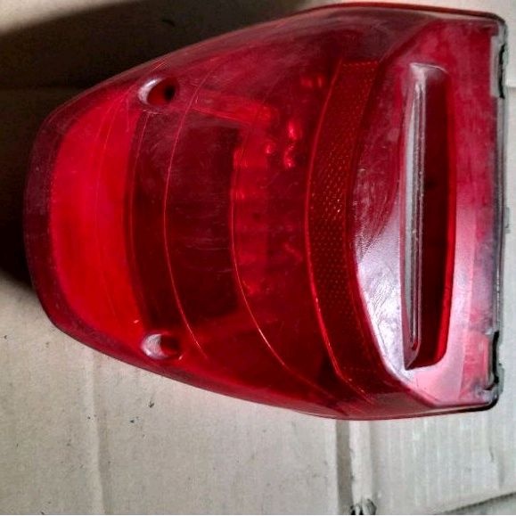 STOP LAMPU MEGAPRO MONO ORI