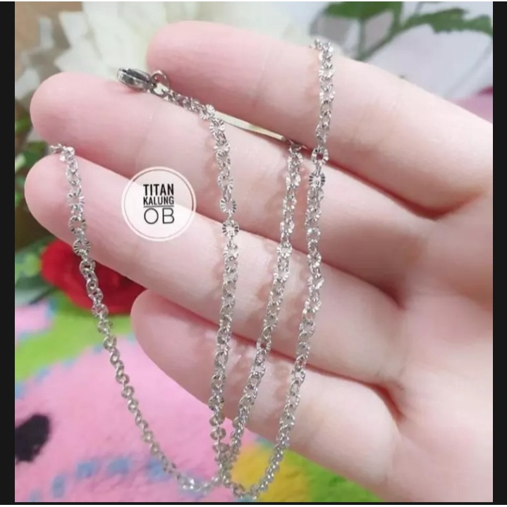 kalung titanium motif nuri untuk pria dan wanita