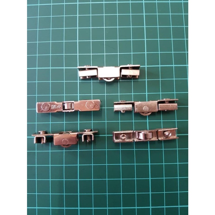 

Roda Rel Kaca Etalase 074
