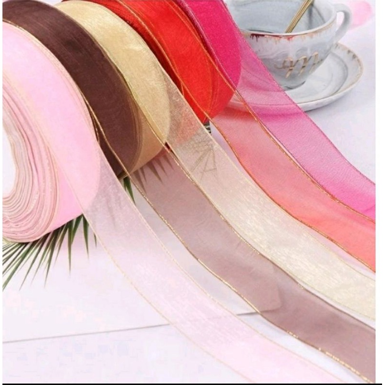 

Pita Organza list emas uk 1 inch / 2,5 cm , Pita Kaca (per roll)