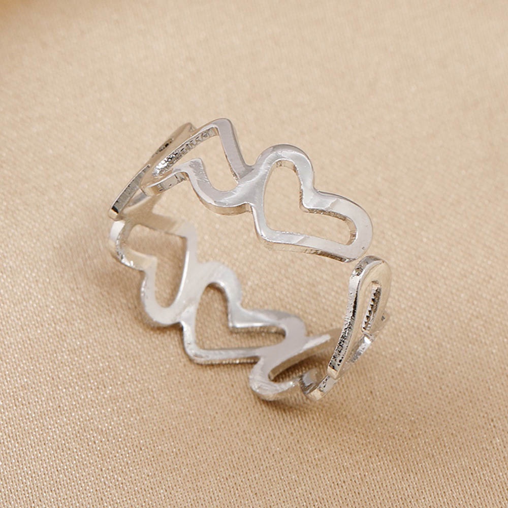 Cincin Model Terbuka Adjustable Bentuk Hati Hollow Out Bahan Metal Warna Emas / Silver Untuk Wanita