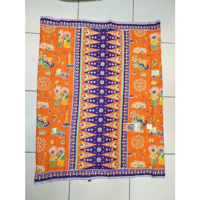 kain batik ondel ondel warna oren ungu