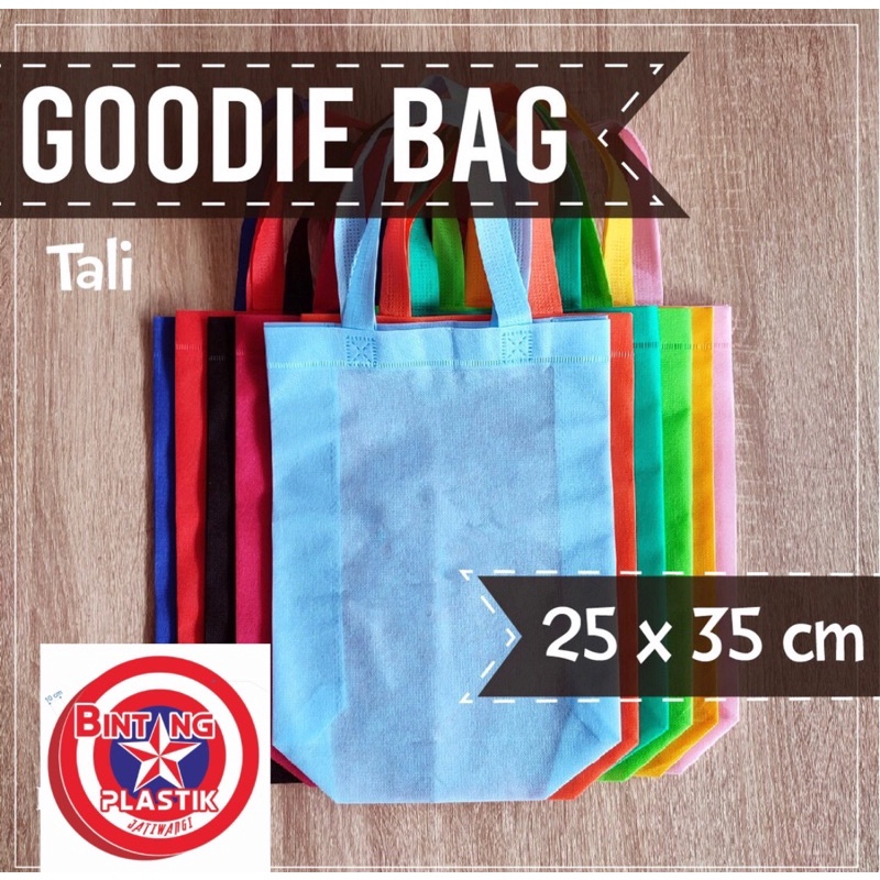 

Goodie bag / Tali press 25x35 cm isi 12pcs / tas kain spunbond Handle Tali / tas ramah lingkungan TERMURAH!!!