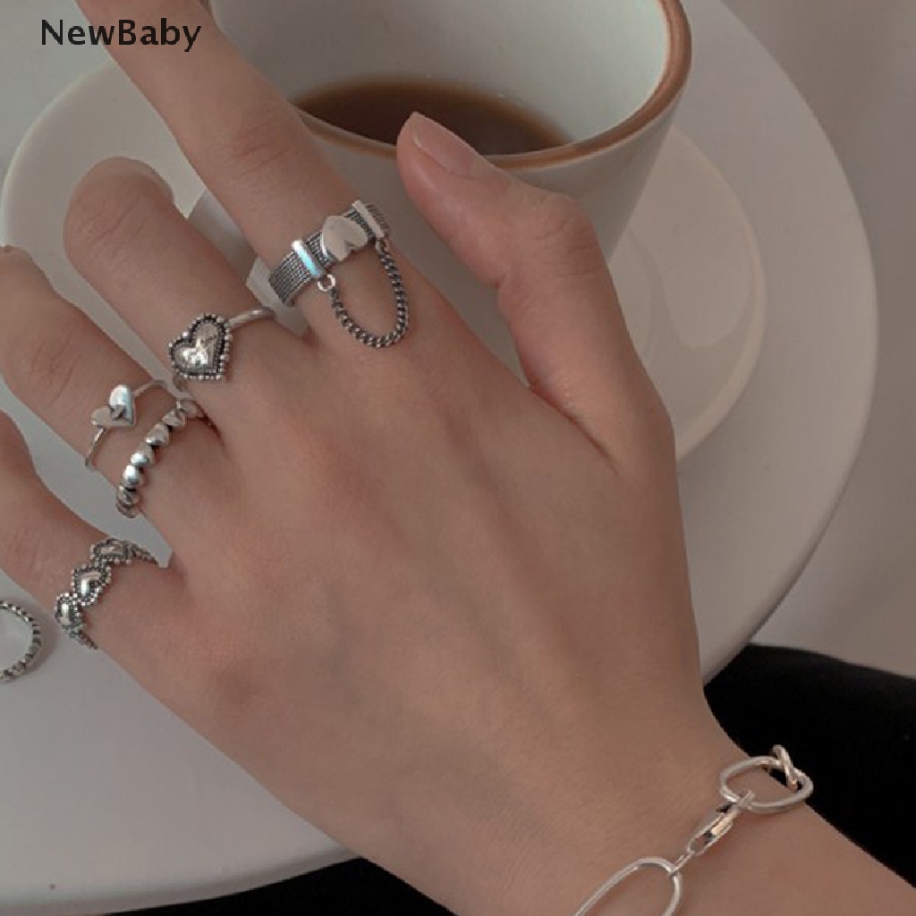 Set Cincin Bentuk Hati Geometris Bahan Zirkon Warna Perak Gaya Punk