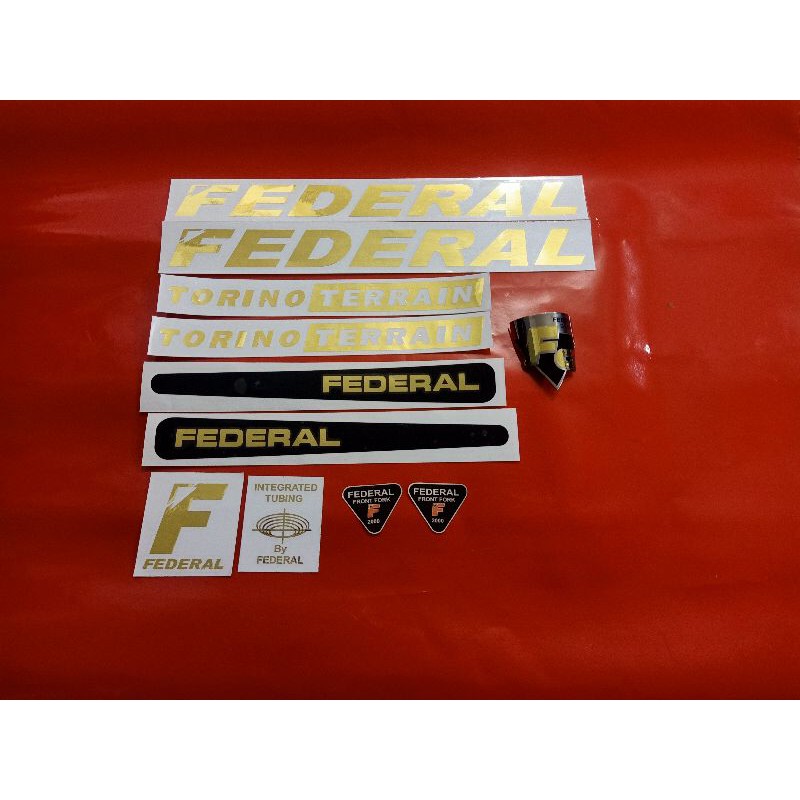 stiker dan emblem sepeda Torino terrain gold dan silver chrome