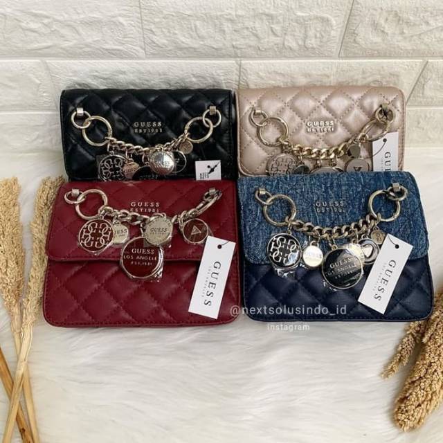 Tas guess victoria quilted mini tassel chain