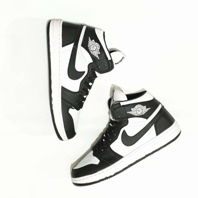 high top jordans black and white