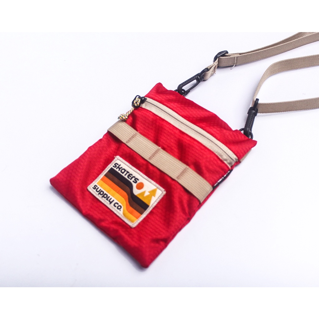 TAS PHONE POUCH SKATERS VD009 MERAH