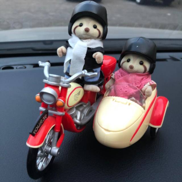 Preloved Sylvanian Families rare racoon with motorbike