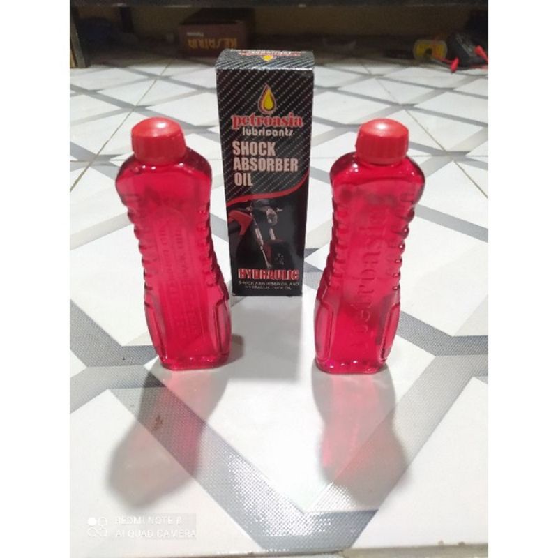 Oli shock UK 200 ml 2 botol untuk semua jenis motor