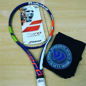 babolat pure aero lite roland garros