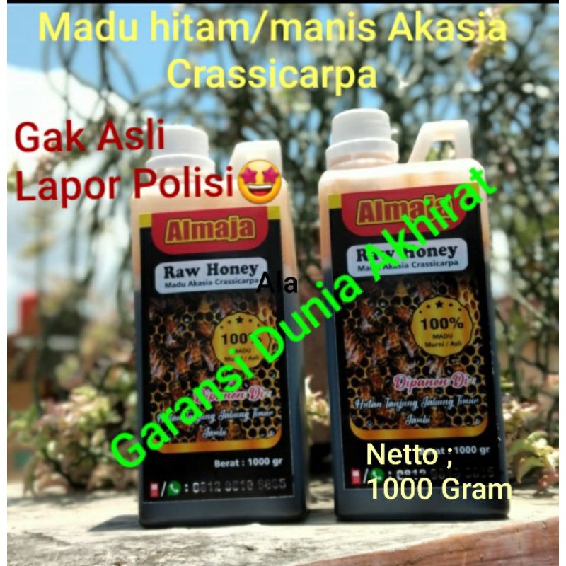 

Madu hitam asli akasia crassicarpa murni