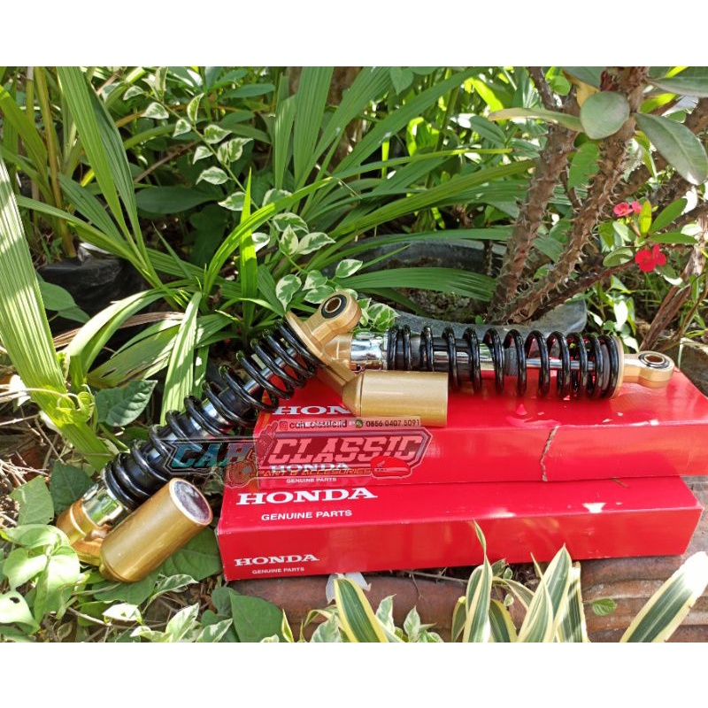 Shock belakang tiger revo tirev import ori