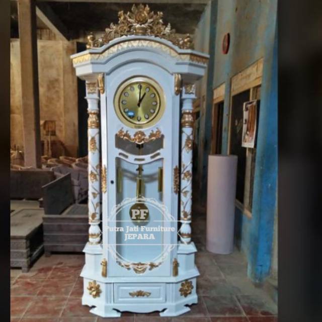 Lemari jam mawar jati jam hias Masjid ukir Jepara warna putih kombinasi