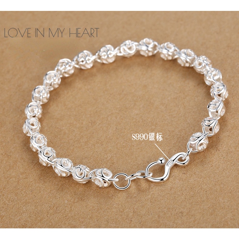 Gelang Tangan Rantai Aksen Bola Hollow Bahan Stainless Steel Warna Silver Untuk Wanita