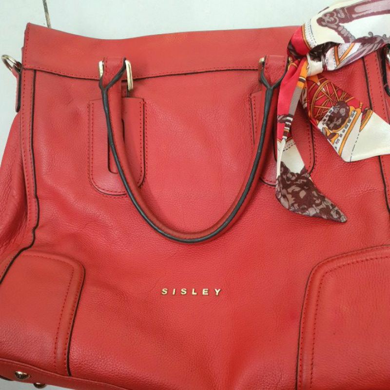 tas merah sisley