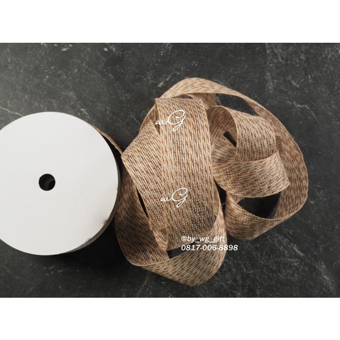 

Pita Goni Garis Coklat ; Lebar 3.8 cm; Panjang 20 yard