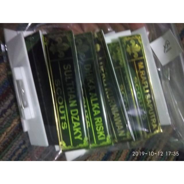 

Papan Nama Dada