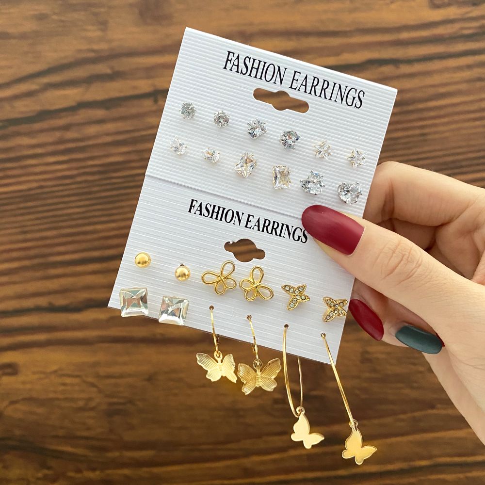 Set Anting Stud Desain Kupu-Kupu Aksen Kristal Mutiara Bahan Resin Warna Emas Untuk Wanita