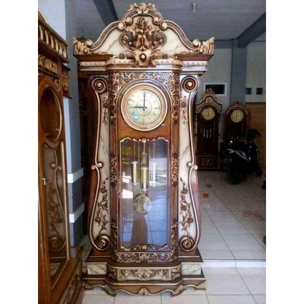 almari jam brawijaya biola ukir kayu jati klasik mewah modern furniture mebel jepara jam gadang