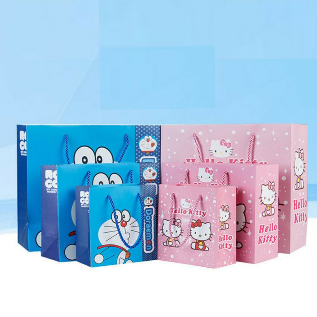 

PAPERBAG KANTONG HADIAH MOTIF DORAEMON HELLO KITTY KANTONG ULANG TAHUN PLASTIK KUE COOKIES