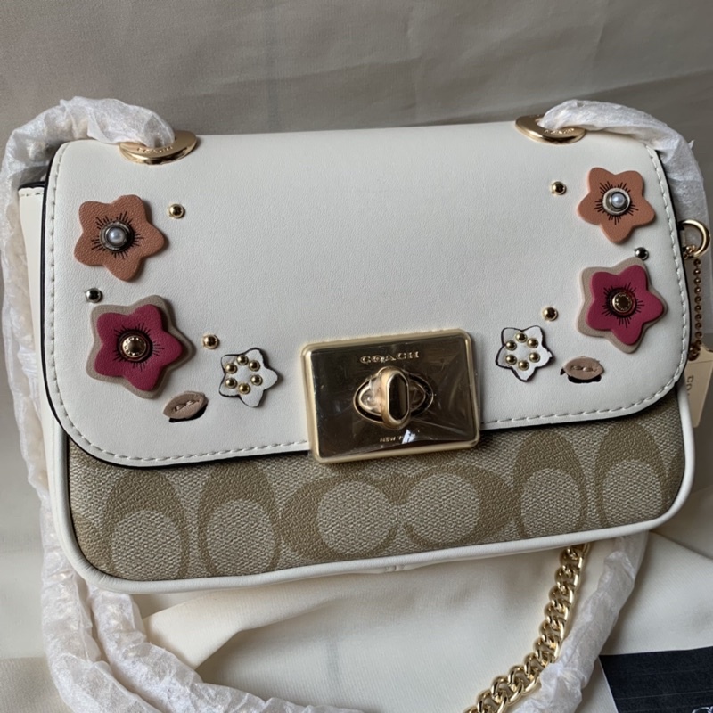 MINI CASSIDY CROSSBODY IN SIGNATURE CANVAS WITH FLORAL APPLIQUE  (COACH F73057)