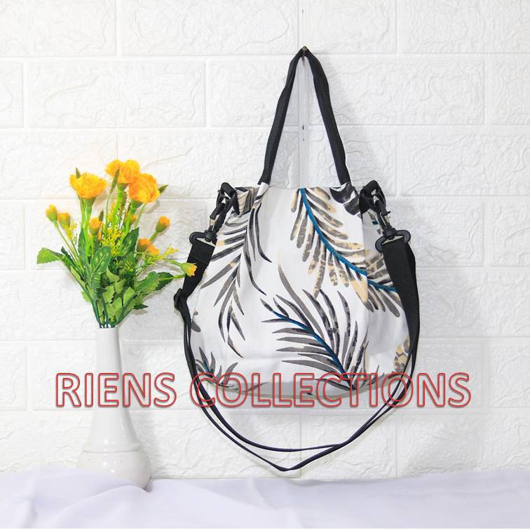 SLING BAG TAS SELEMPANG KANVAS MOTIF FLORAL LATAR PUTIH RIENS COLLECTIONS. TAS KANVAS JOGJA