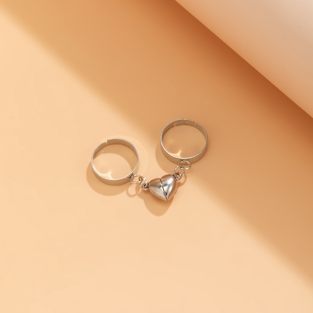 2pcs / Set Cincin Magnet Bentuk Hati Bahan Metal Gaya Punk Untuk Pasangan