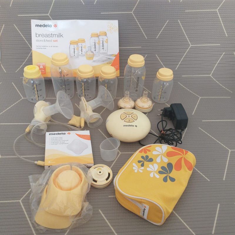 GARAGE SALE preloved pumping asi merk medela ori