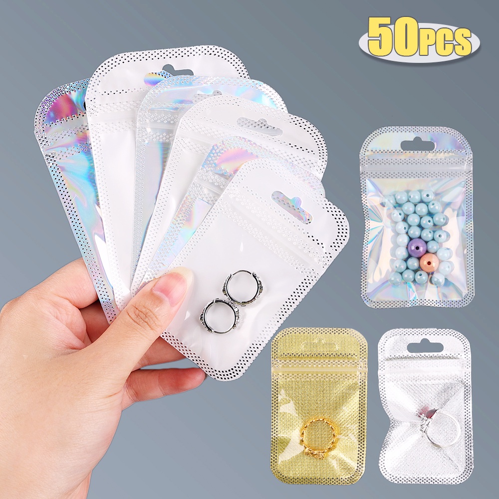 50pcs / Pak Kantong Plastik Ziplock Mini Portable Transparan Untuk Perhiasan