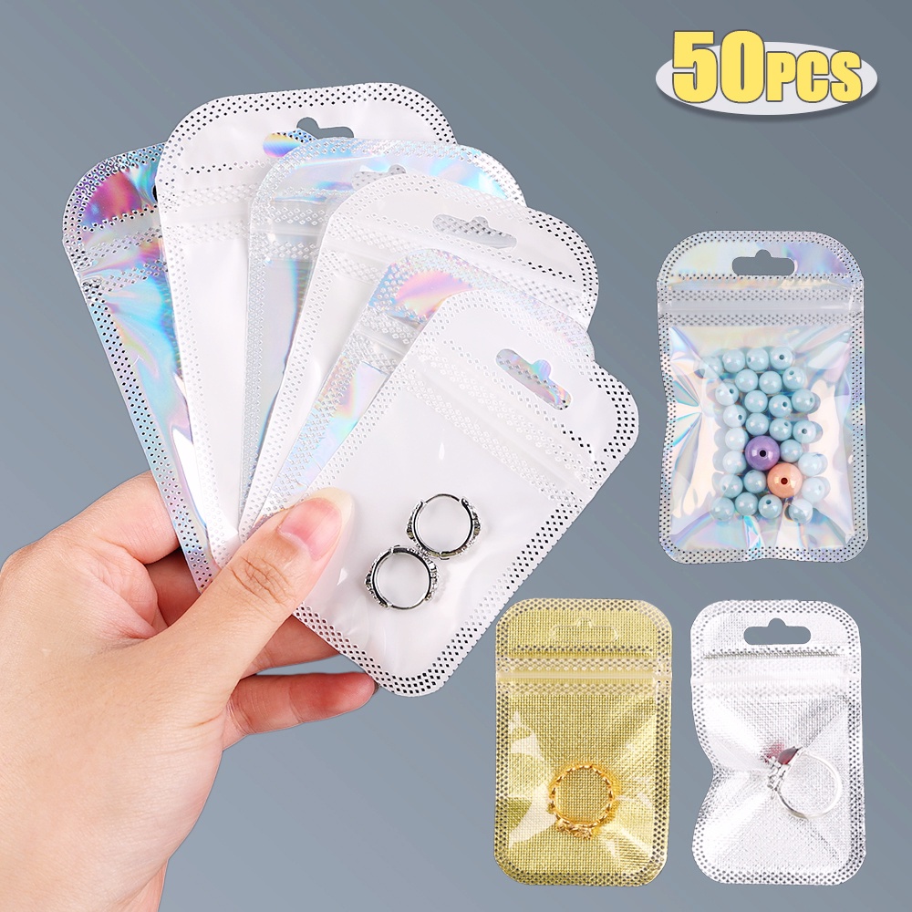 50pcs / Pak Kantong Plastik Ziplock Mini Portable Transparan Untuk Perhiasan