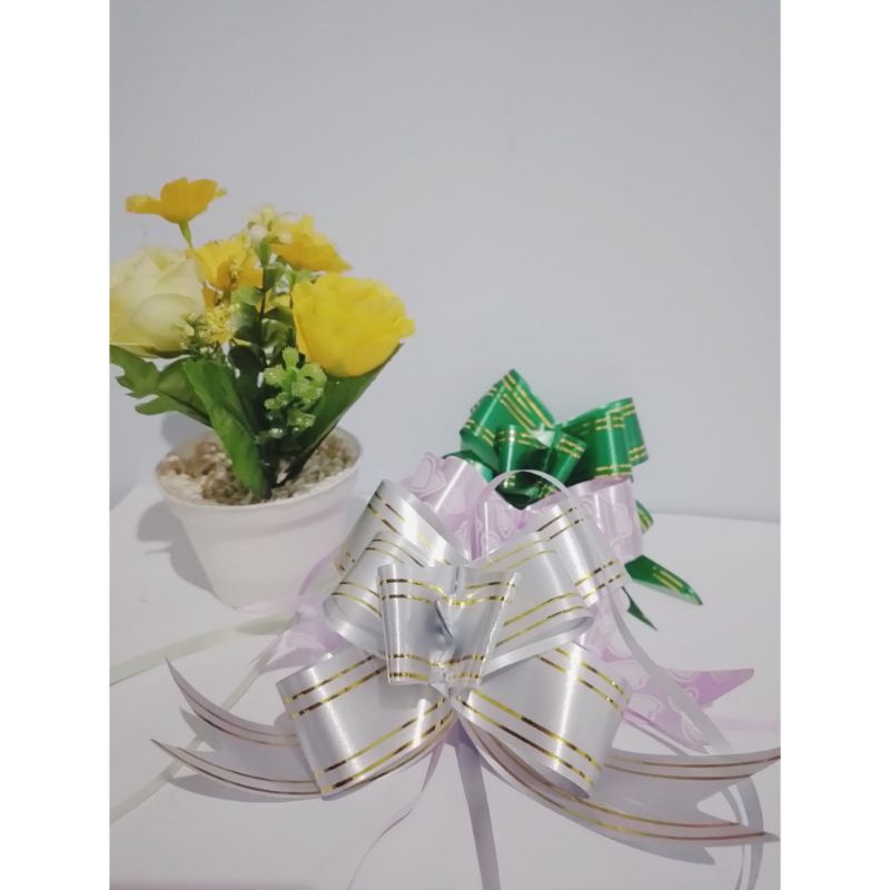 

Pita-tarik | Pita-Kado | aksesoris-souvenir