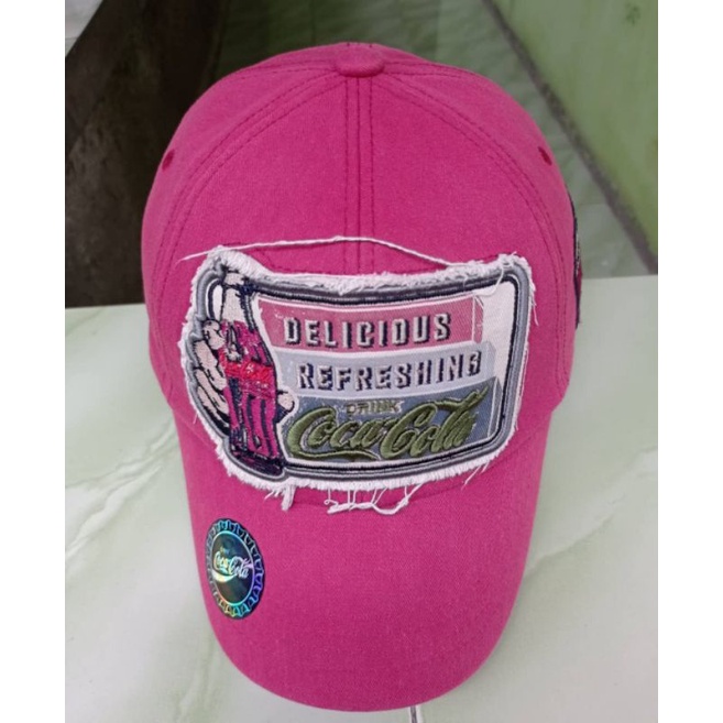 topi second coca cola