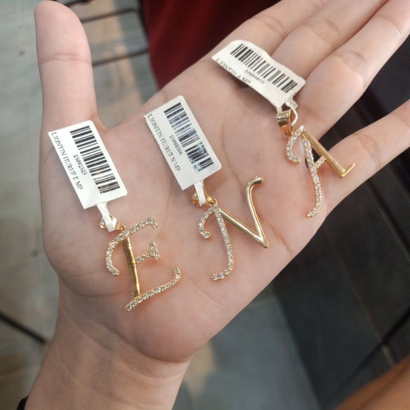 liontin huruf kadar 375%